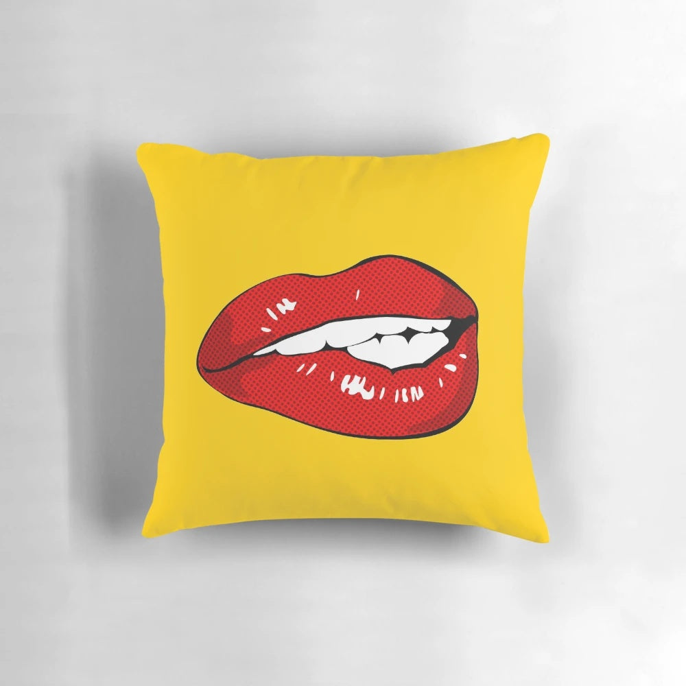 Vibrant pop art-inspired throw pillow with a woman's lips in a sexy, biting expression.