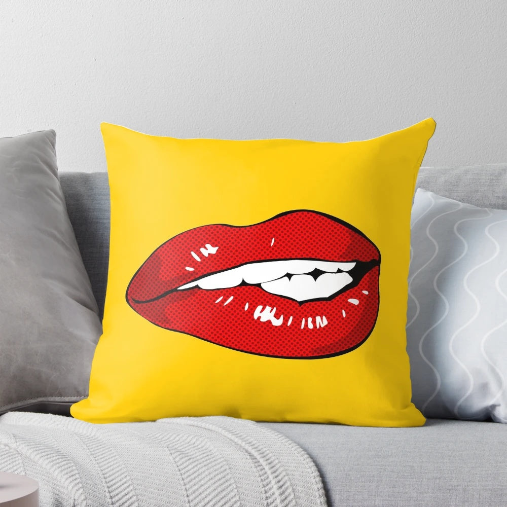 Vibrant pop art-inspired throw pillow with a woman's lips in a sexy, biting expression.