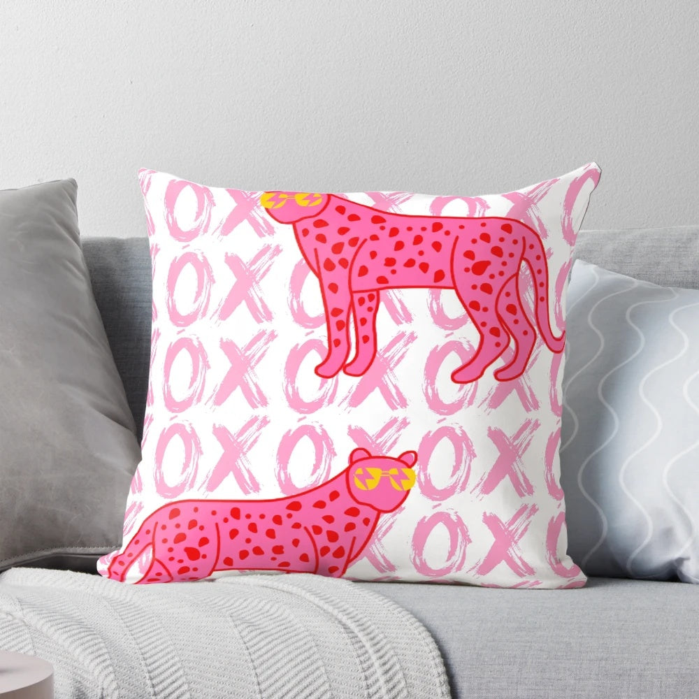 Decorative pillow featuring a cheetah print with a stylish, preppy design