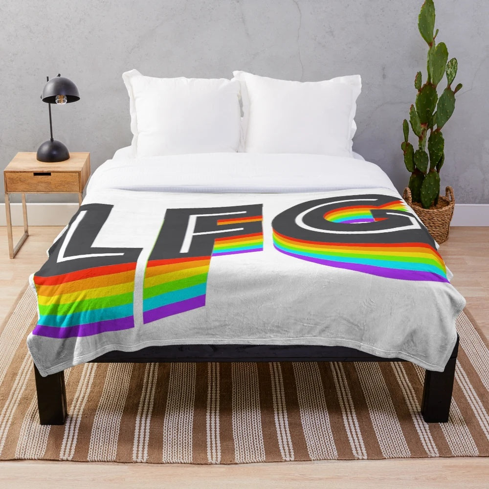 Colorful pride-themed plush blanket with basketball and heart design