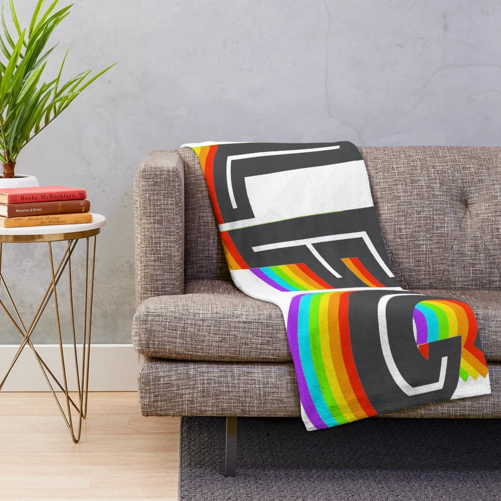 Colorful pride-themed plush blanket with basketball and heart design