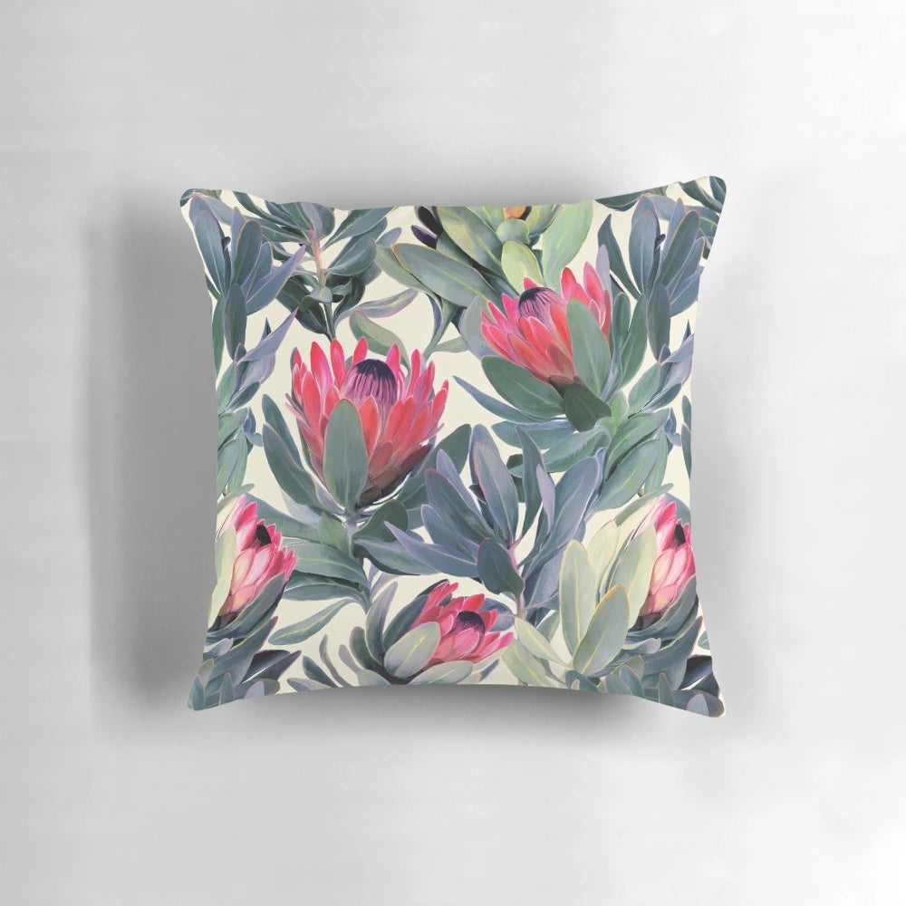 Vibrant protea floral pattern printed on a soft and comfortable pillow