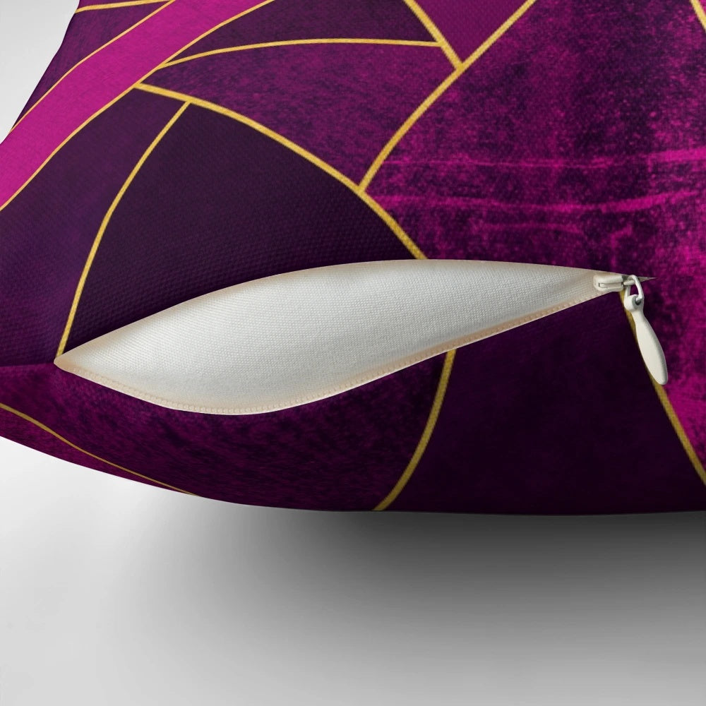 Purple and gold geometric patterned pillow