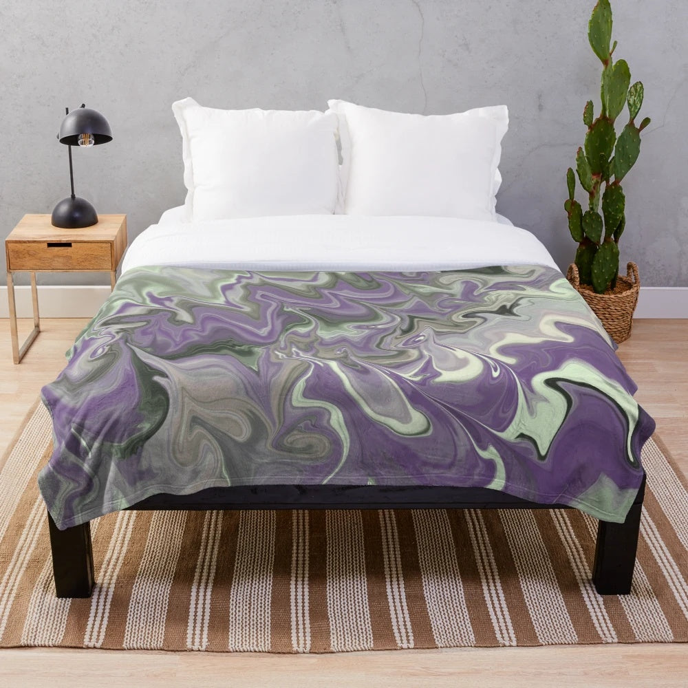 Purple and sage plush blanket with abstract zigzag and swirl pattern