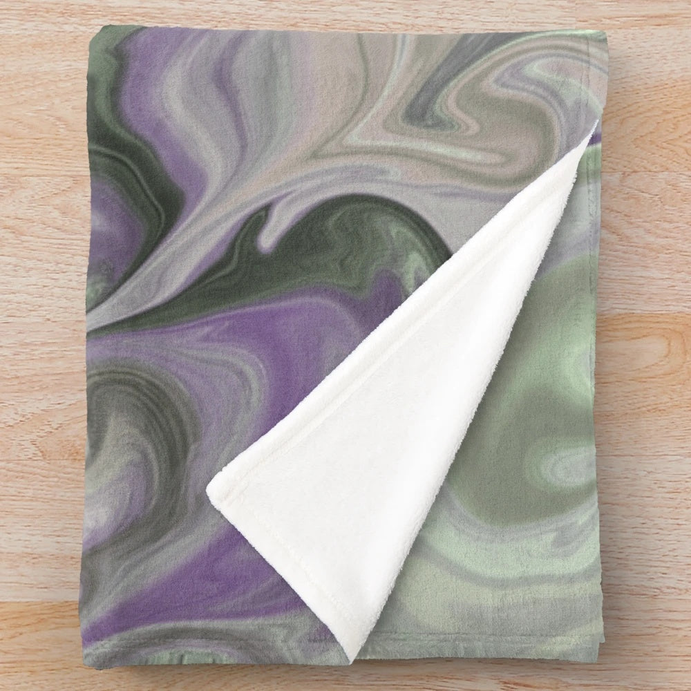 Purple and sage plush blanket with abstract zigzag and swirl pattern