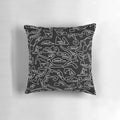 Decorative pillow featuring a racing circuit pattern design for motorsports enthusiasts