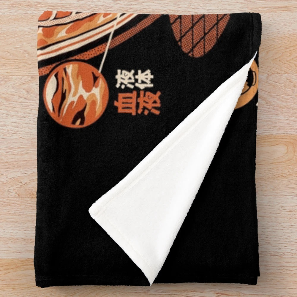 Plush blanket featuring a ramen-inspired kaiju design