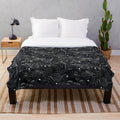 Raven pattern plush blanket for cozy and stylish home decor