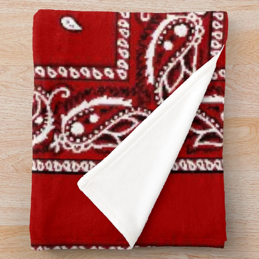 Red bandana-patterned plush blanket