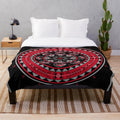 Red bear plush blanket with native american inspired geometric design