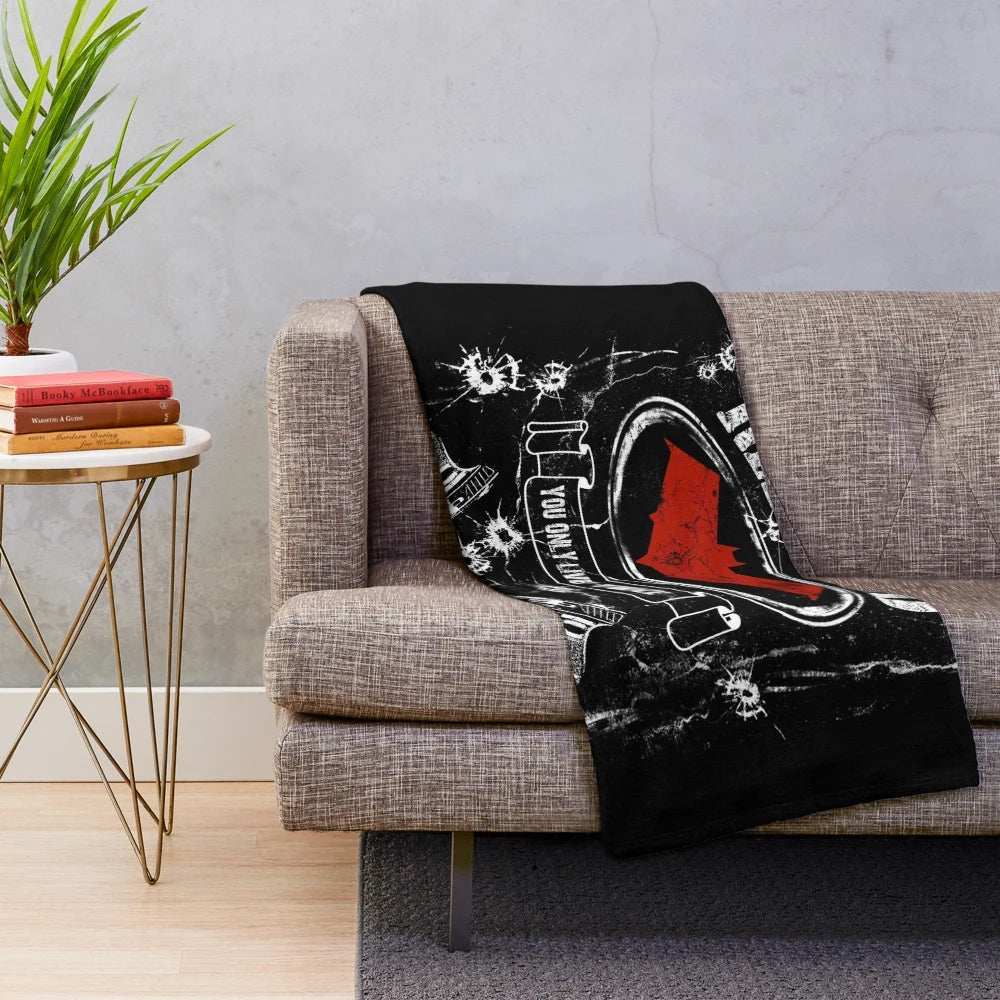 Red plush blanket with whiskey-inspired label design