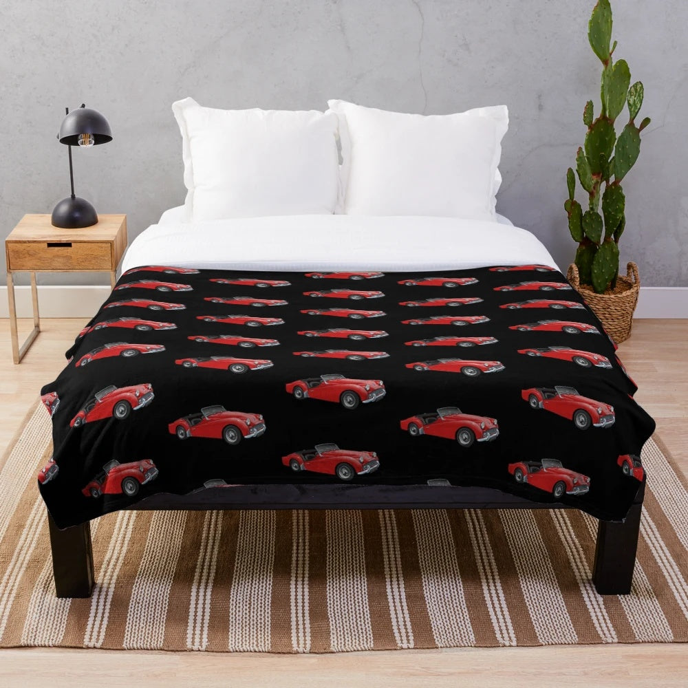 Plush blanket with a classic Triumph TR3 sports car design