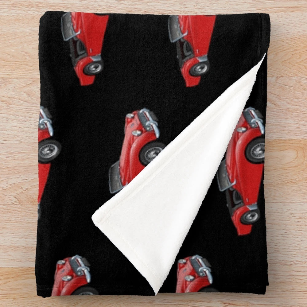 Plush blanket with a classic Triumph TR3 sports car design