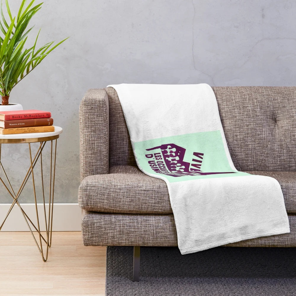 Plush revolution-themed blanket with slogans and factory imagery