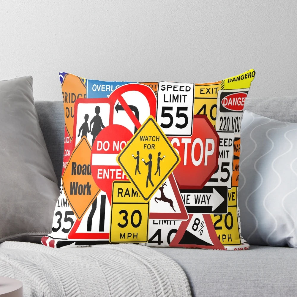 Decorative pillow featuring assorted road and traffic signs