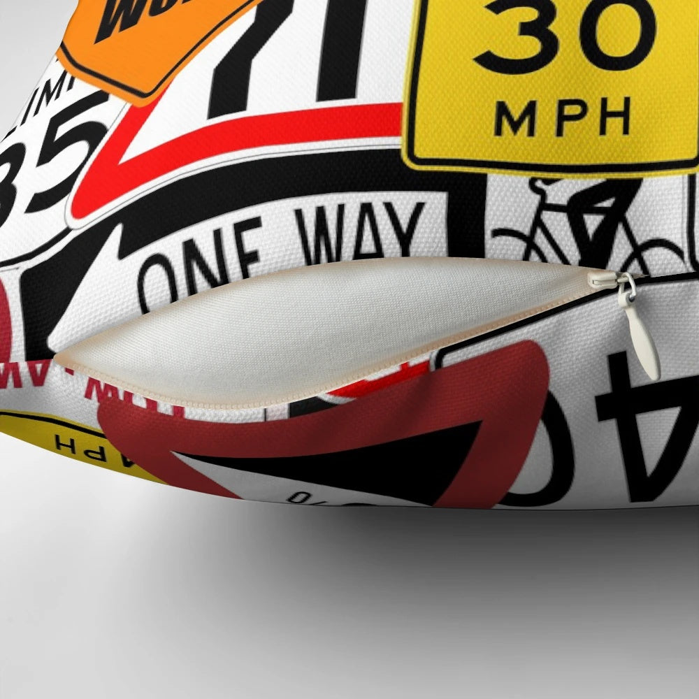 Decorative pillow featuring assorted road and traffic signs