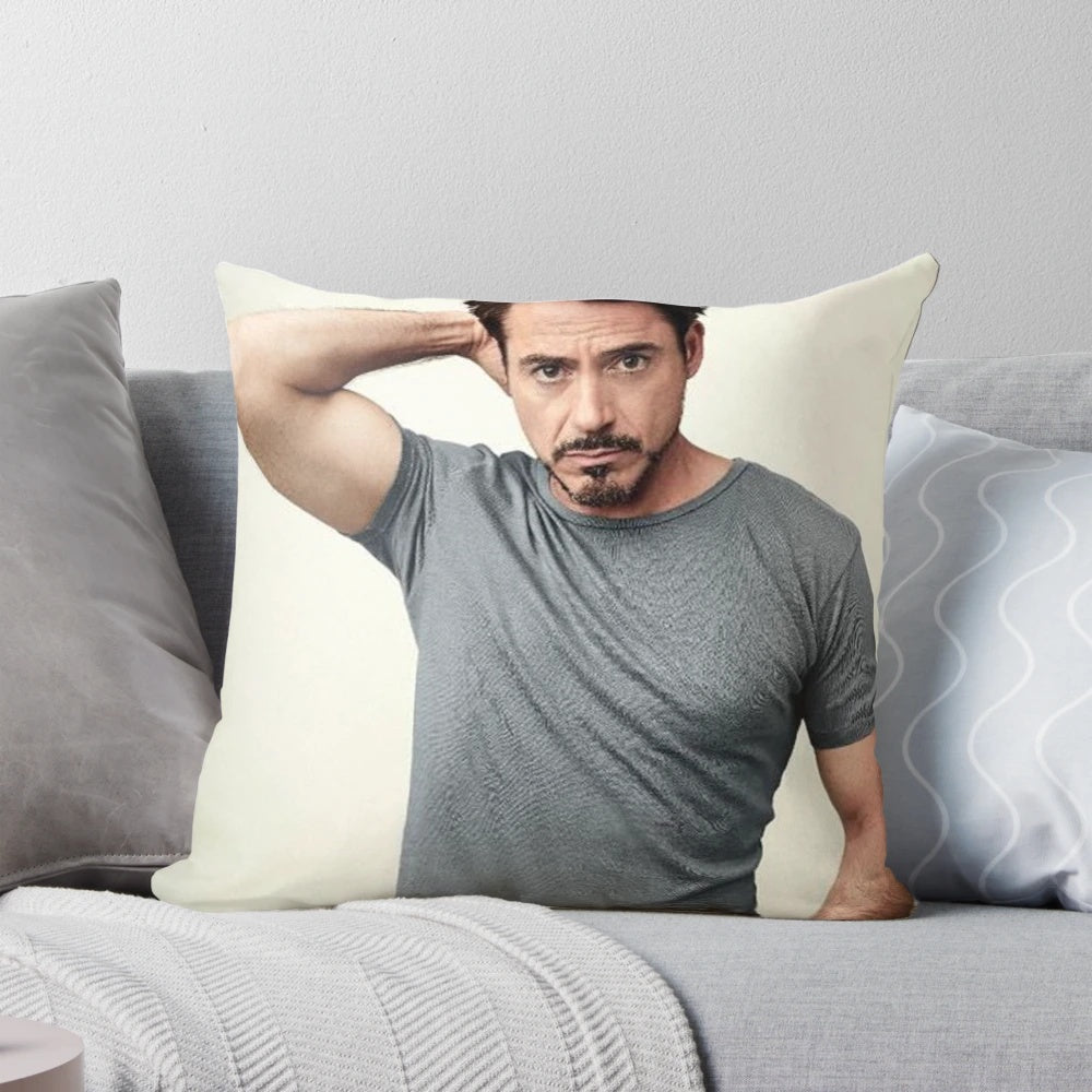 Plush pillow featuring the likeness of actor Robert Downey Jr as Iron Man