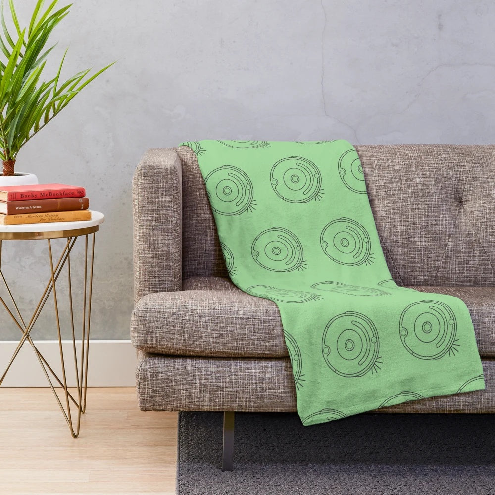 Circular pattern plush blanket inspired by robot vacuum design
