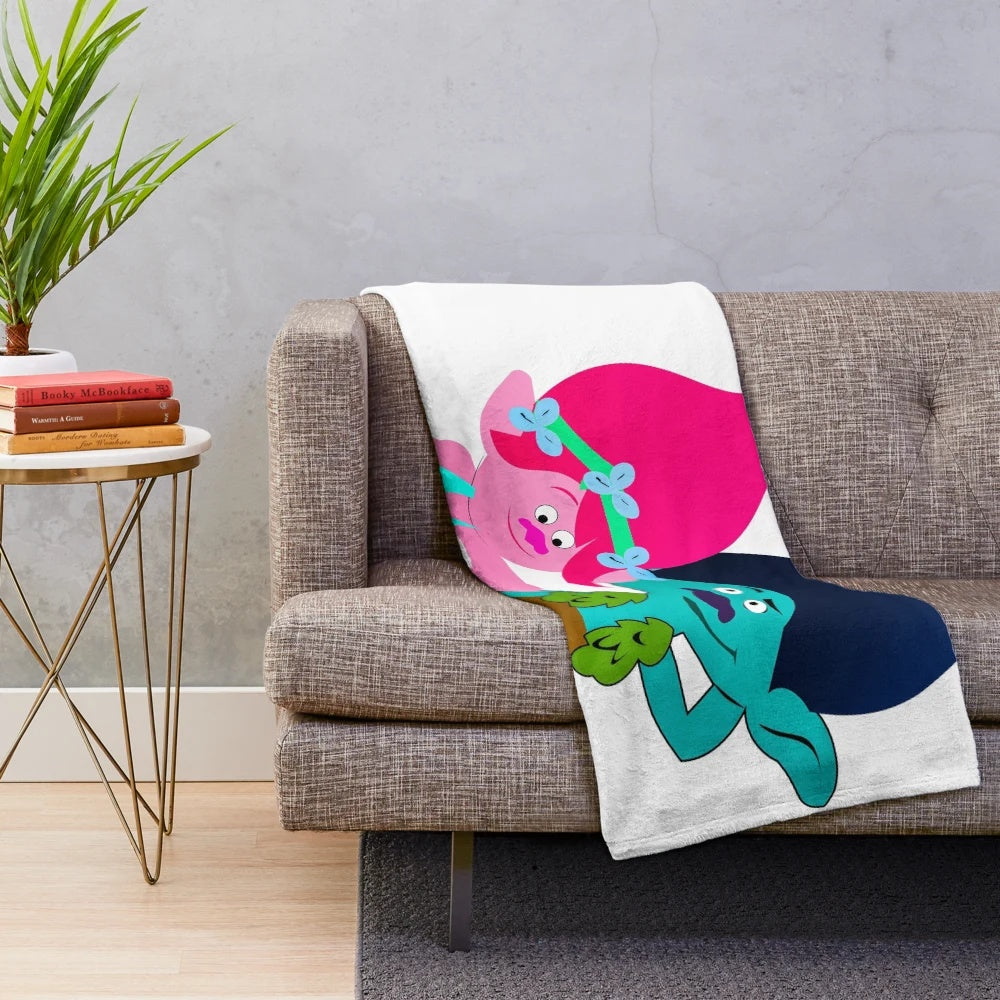 A cozy and stylish rock broppy plush blanket for music enthusiasts