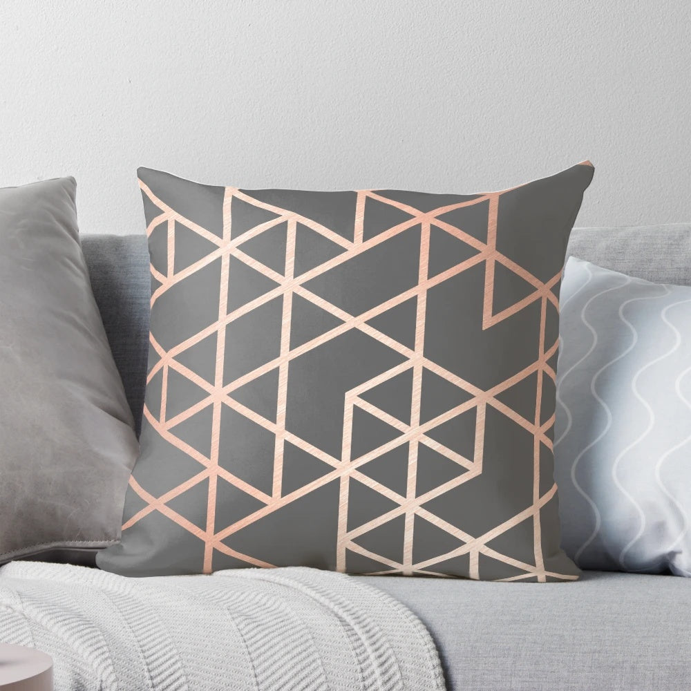 Rose gold and gray geometric patterned decorative pillow