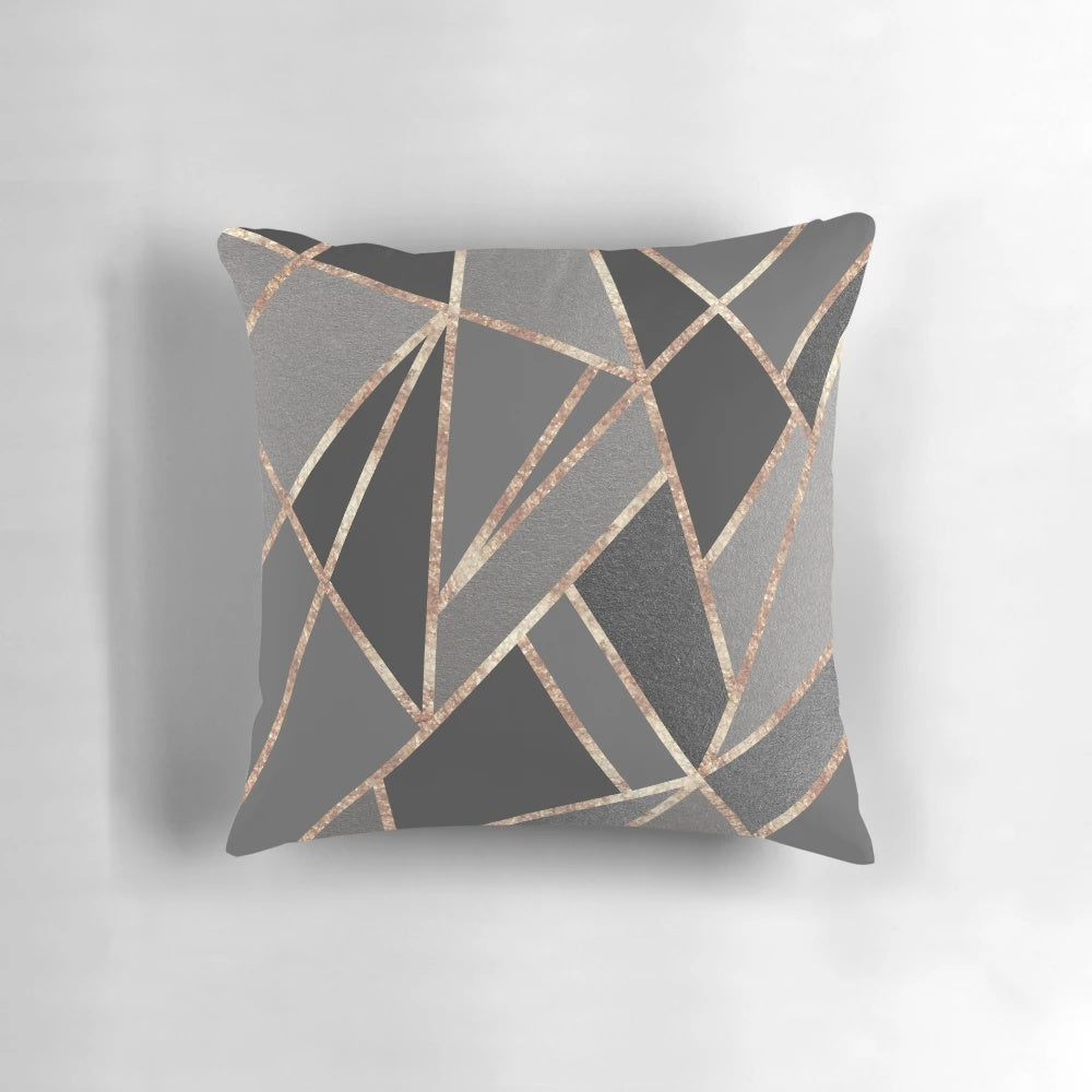 A stylish rose gold gray geometric throw pillow with a minimalist Scandinavian-inspired design, perfect for modern home decor.