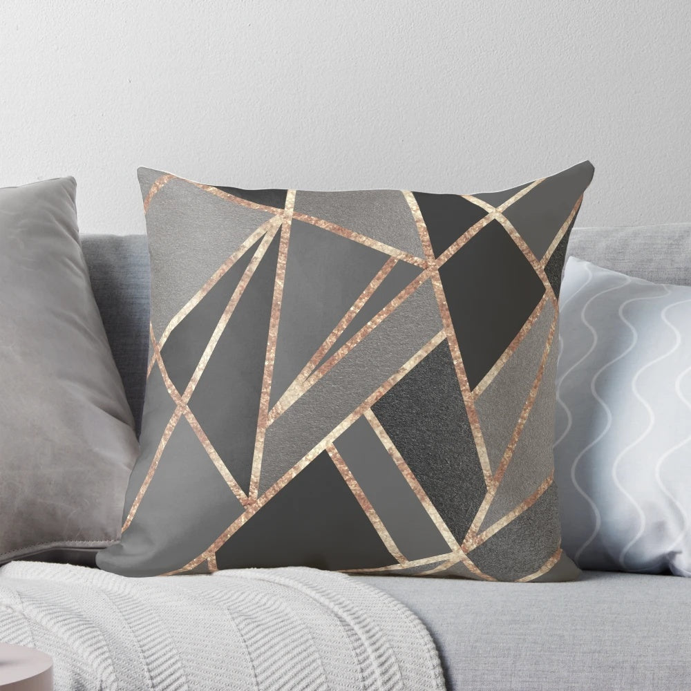 A stylish rose gold gray geometric throw pillow with a minimalist Scandinavian-inspired design, perfect for modern home decor.