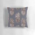 Rose gold and glitter pineapple design on a gray pillow