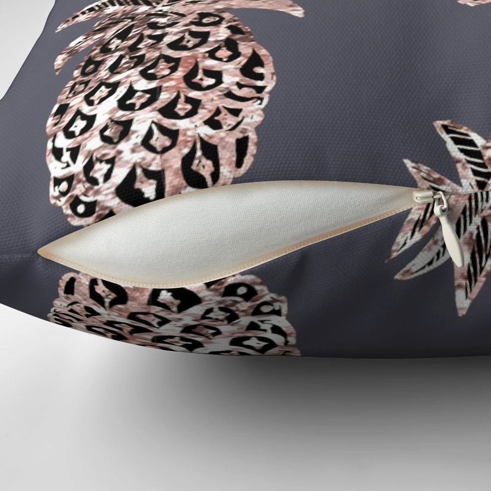 Rose gold and glitter pineapple design on a gray pillow