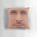 A high-quality throw pillow featuring the face of actor Ryan Gosling