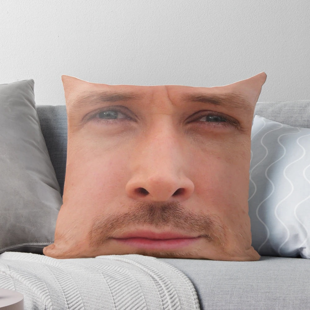 A high-quality throw pillow featuring the face of actor Ryan Gosling