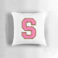 Pink "S" patch decorative pillow for modern, preppy home decor