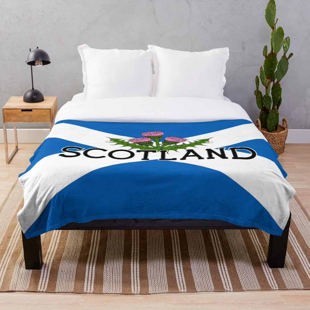 Plush blanket featuring the Scottish Saltire flag and thistle design