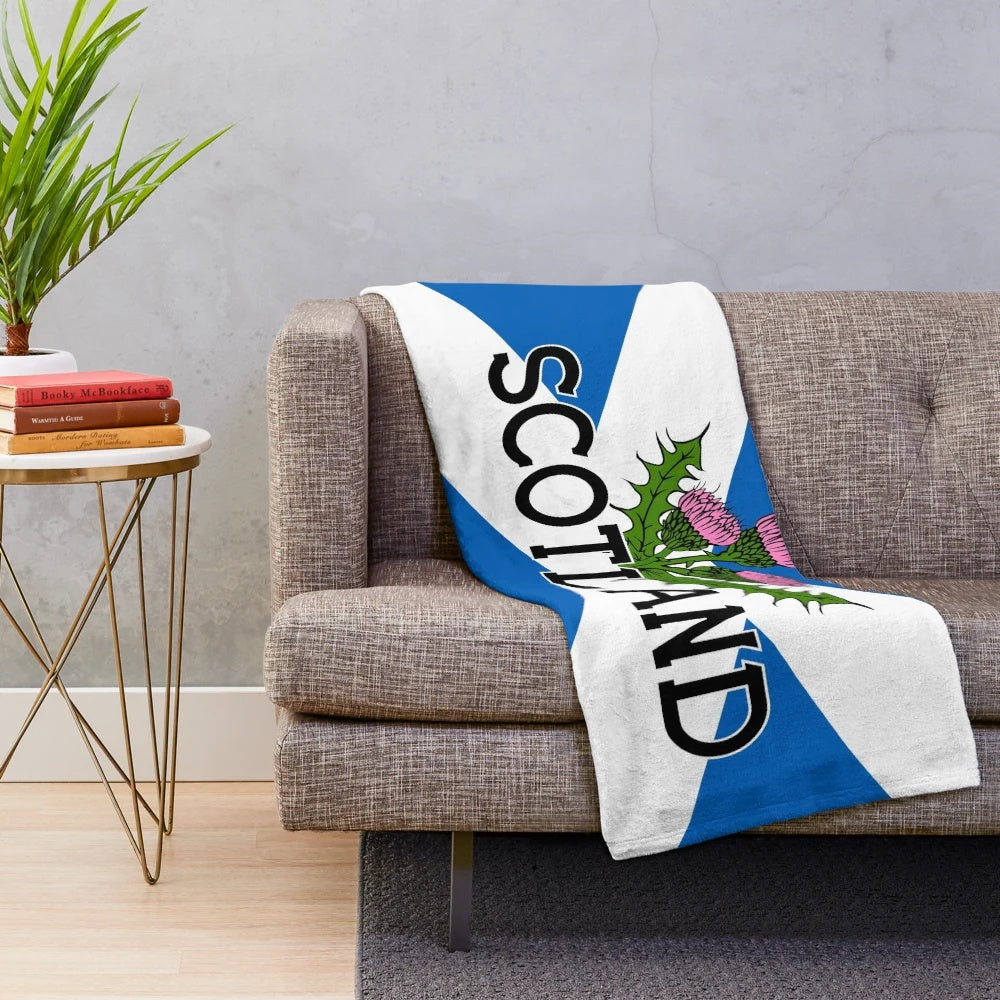 Plush blanket featuring the Scottish Saltire flag and thistle design