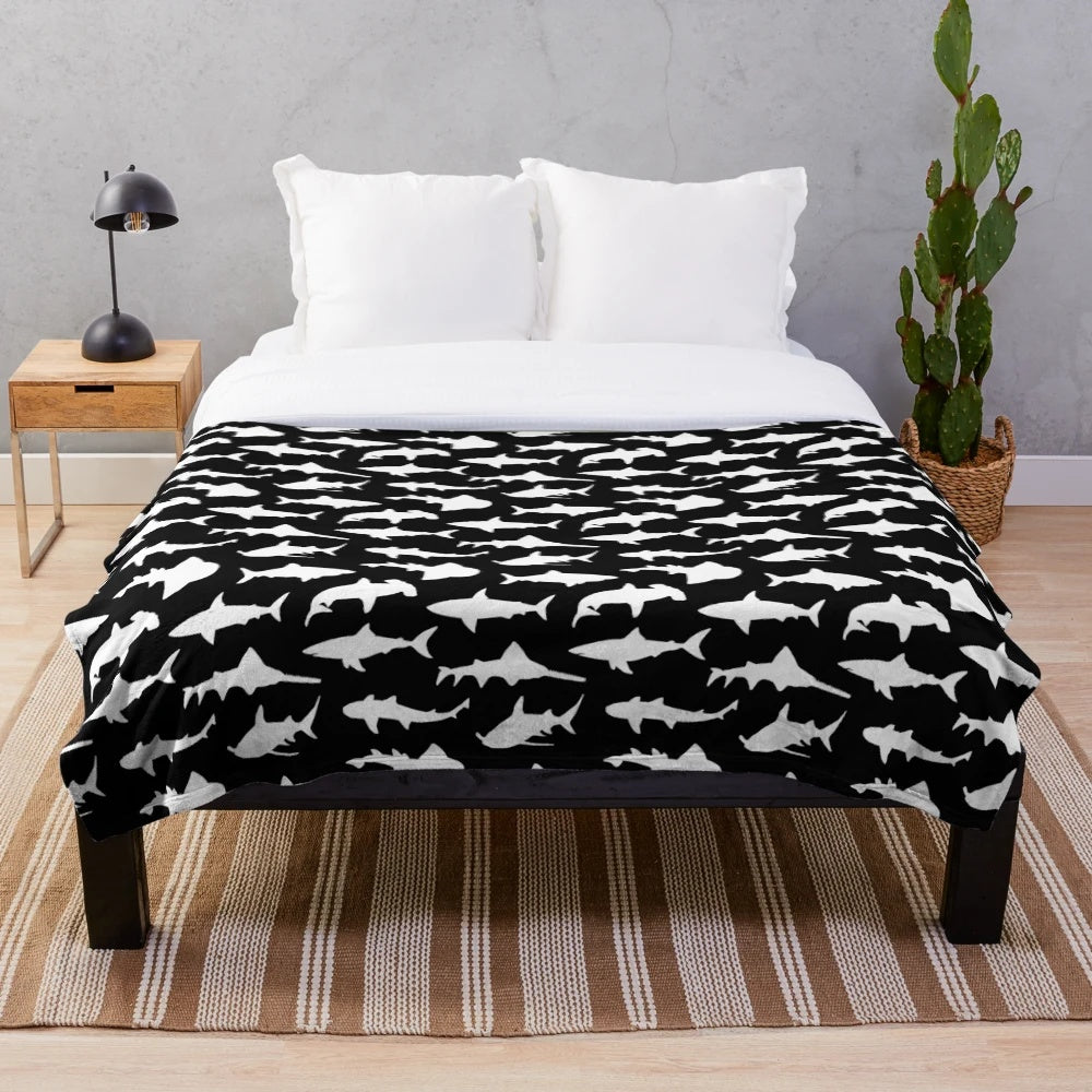 Sharks silhouettes on a black and white minimalist plush blanket