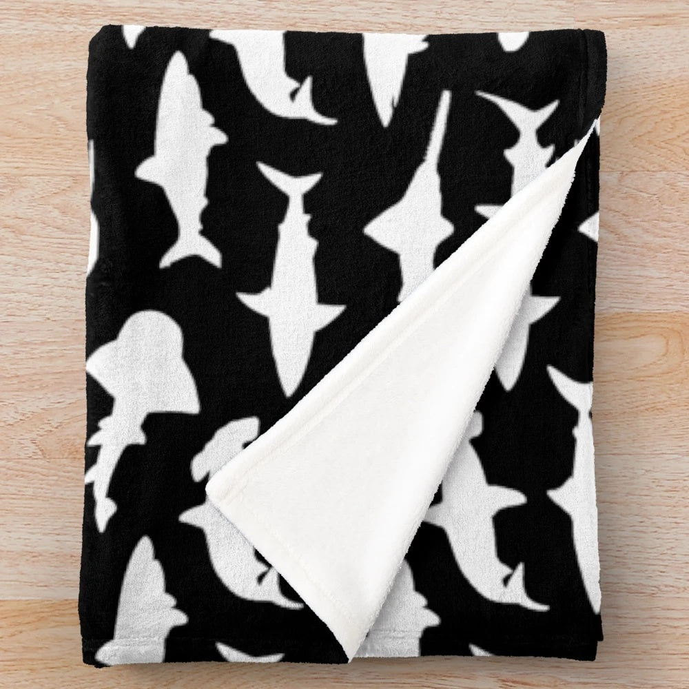 Sharks silhouettes on a black and white minimalist plush blanket