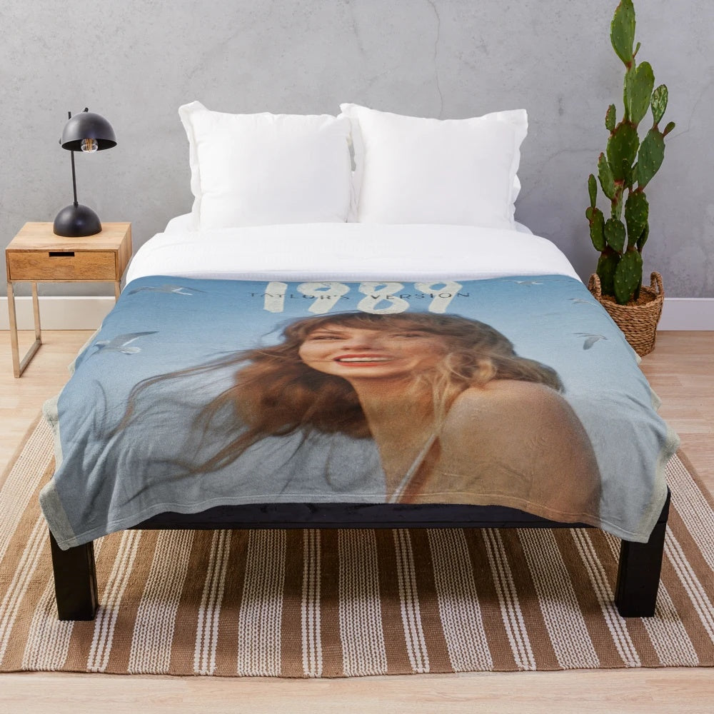 Silhouette of Taylor Swift during the 1989 album era on a plush blanket