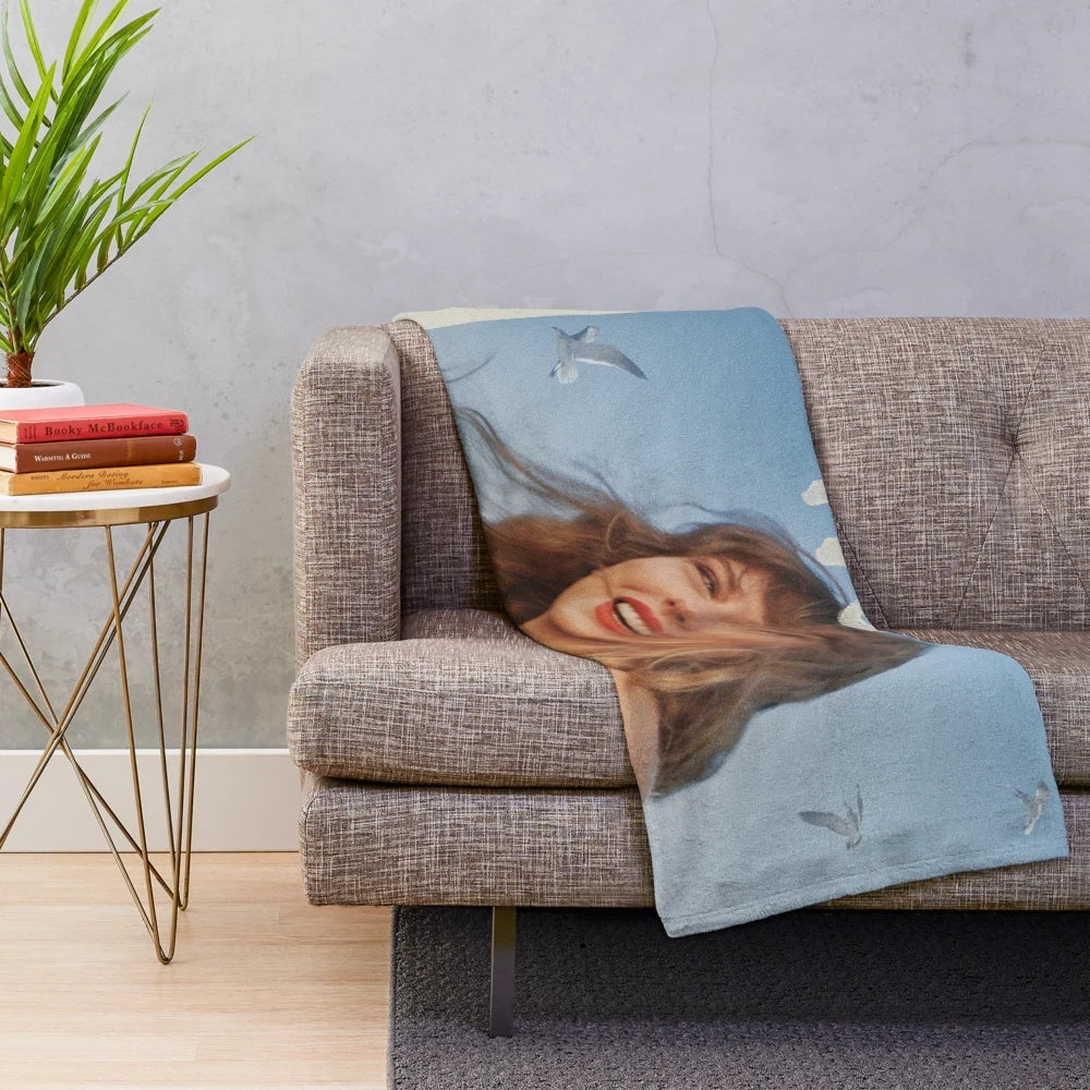 Silhouette of Taylor Swift during the 1989 album era on a plush blanket