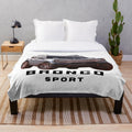 Silver plush blanket featuring the Ford Bronco Sport design