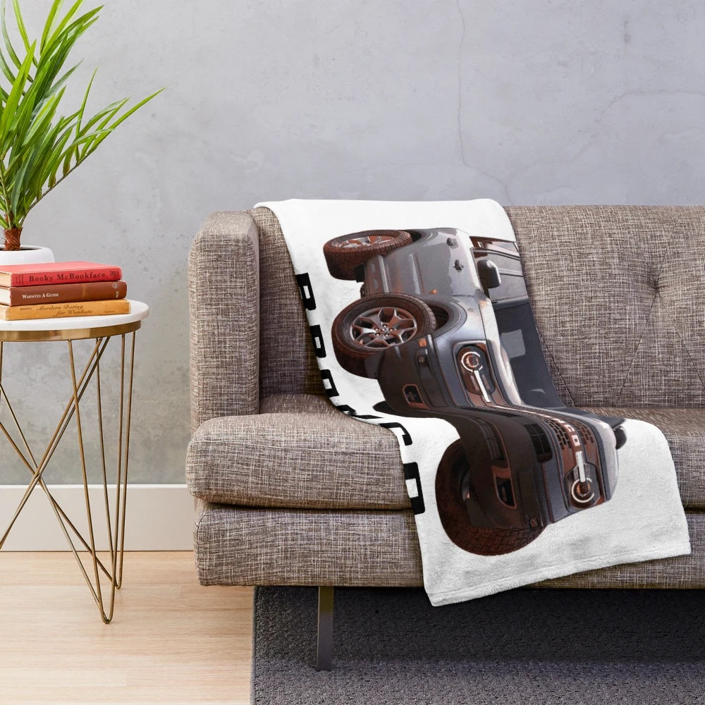 Silver plush blanket featuring the Ford Bronco Sport design