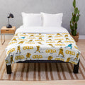 Cozy plush blanket with a soccer-inspired sketch design