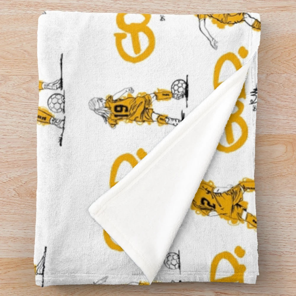Cozy plush blanket with a soccer-inspired sketch design