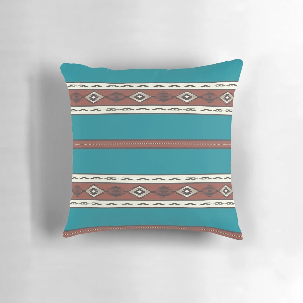 Southwest teal decorative pillow with Navajo and Aztec inspired patterns