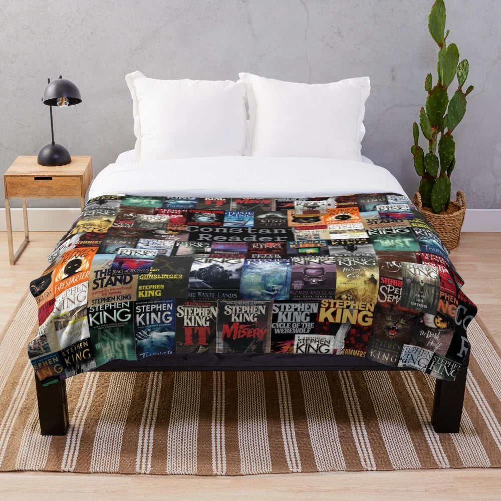 Plush blanket featuring iconic Stephen King book covers