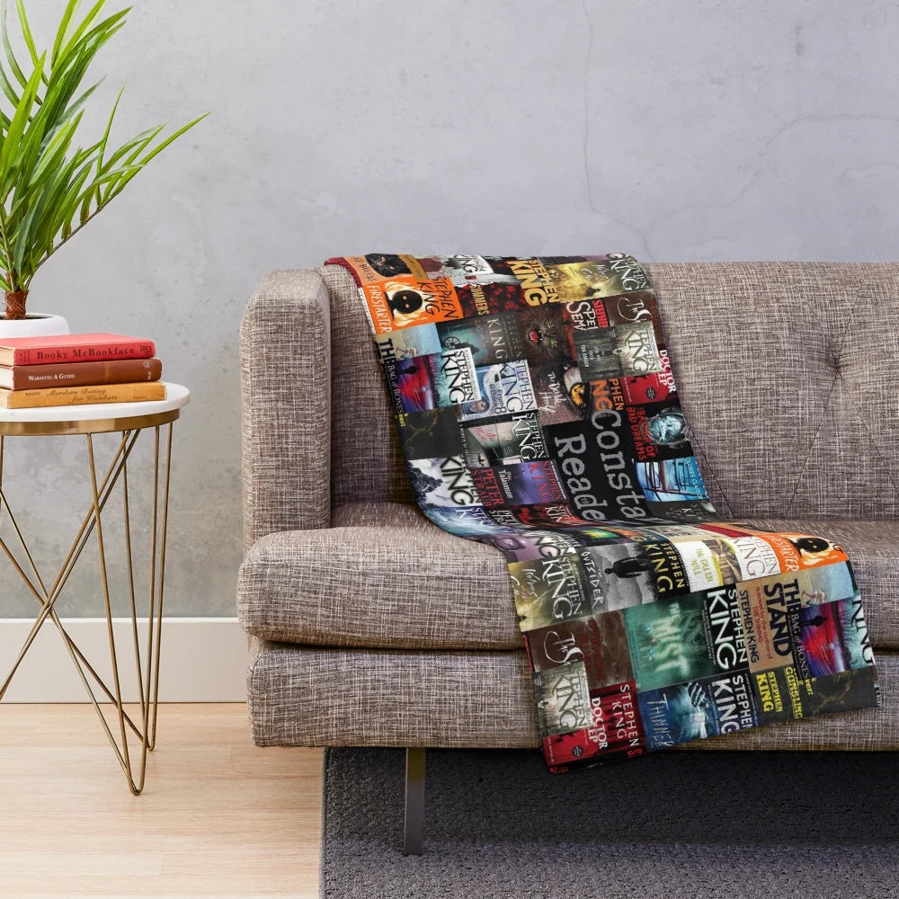 Plush blanket featuring iconic Stephen King book covers