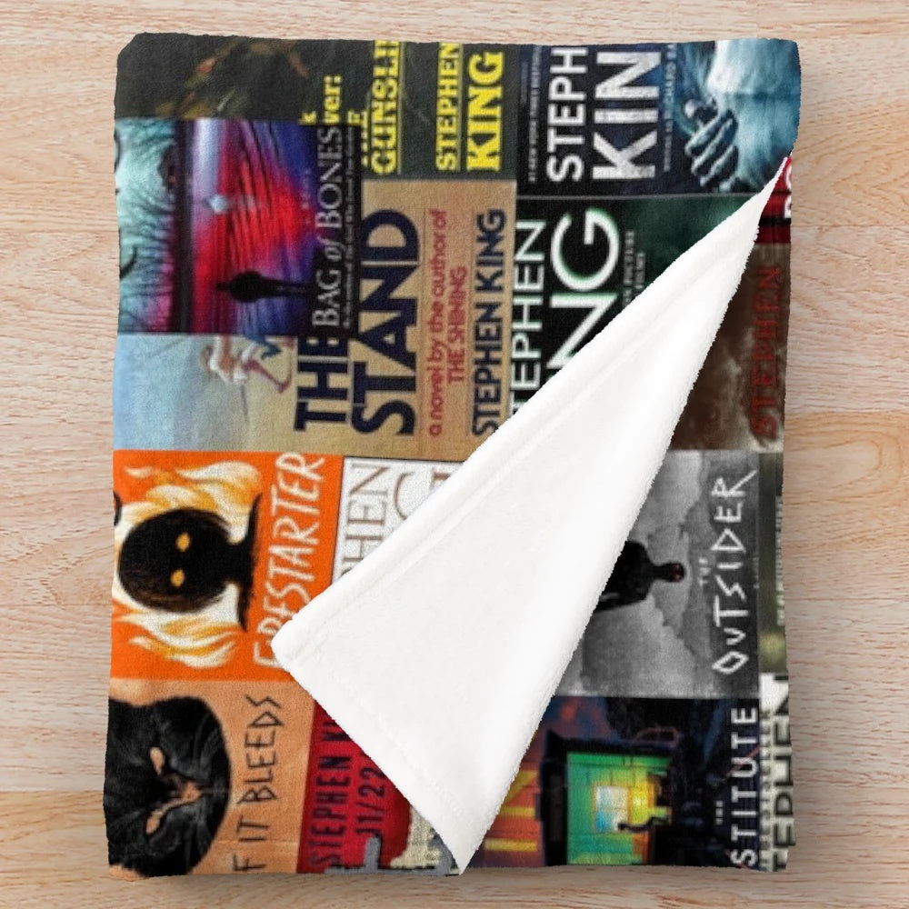 Plush blanket featuring iconic Stephen King book covers