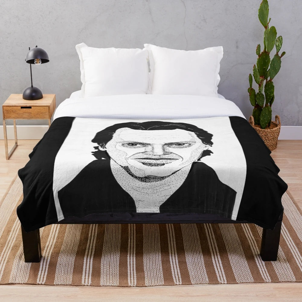 Black and white ink drawing portrait of Steve Buscemi on a plush blanket