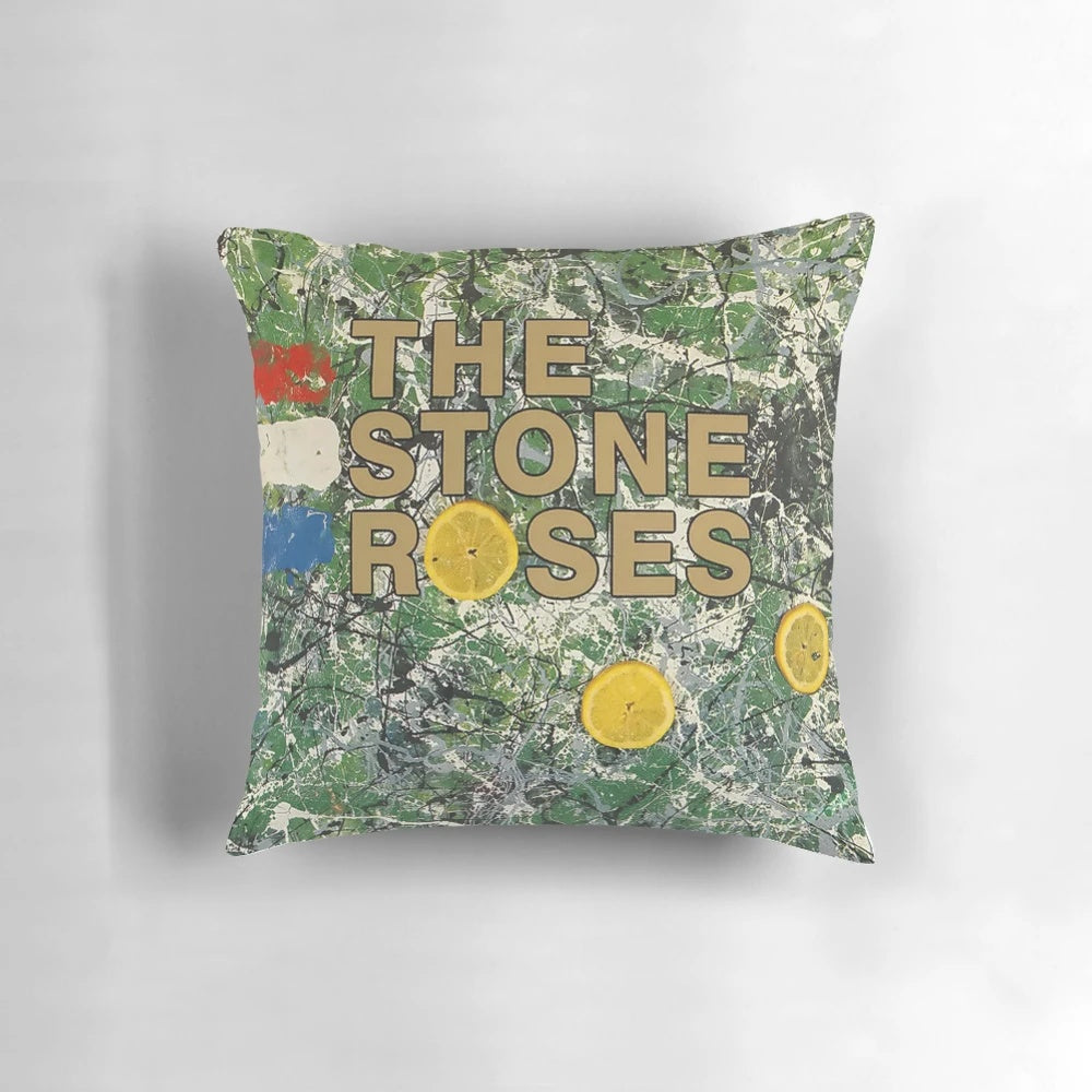 Yellow pillow with The Stone Roses logo and design