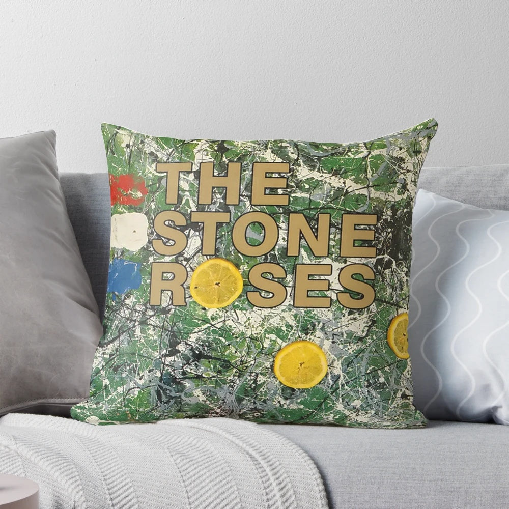 Yellow pillow with The Stone Roses logo and design