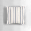 Striped navy blue and white pillow with a minimalist design