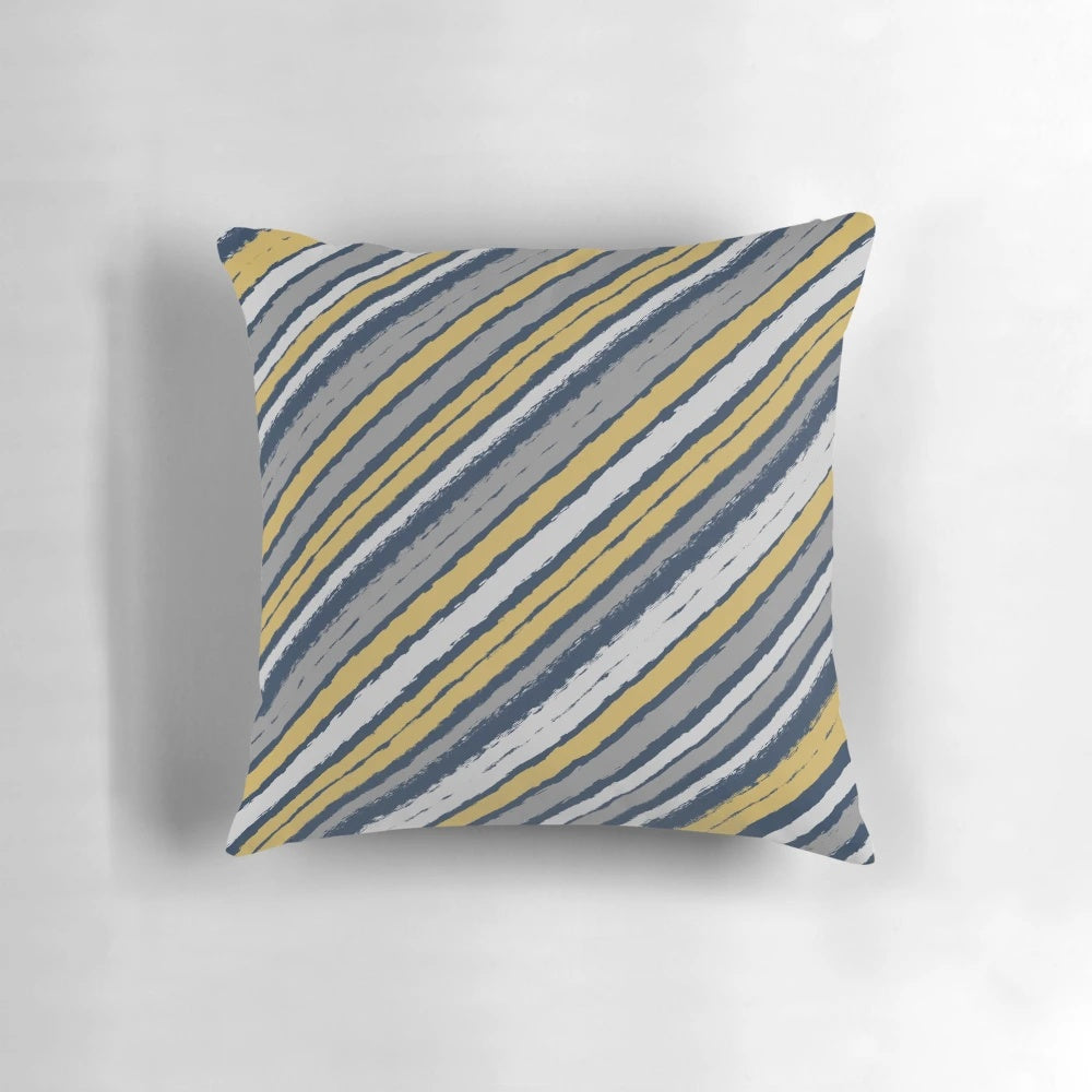 Grey, mustard yellow, and blue brush stroke striped pillow